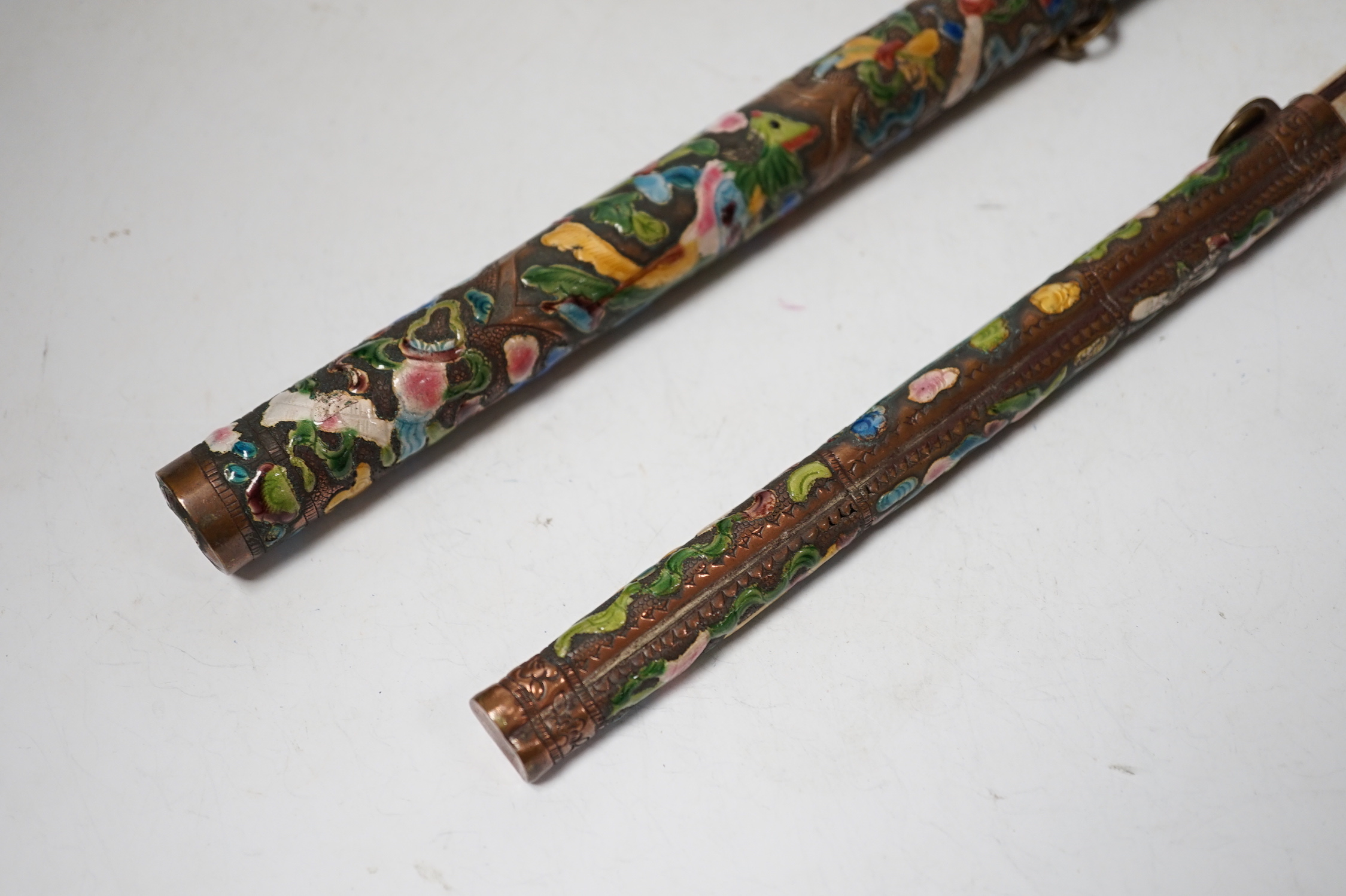 Two Chinese enamelled metal chopstick and knife cases, early 20th century, tallest 10.5cm high